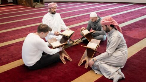 Muslims learning how to read Quran