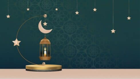 Crescent moon, stars, and a golden lantern with a lit candle on a patterned green background.